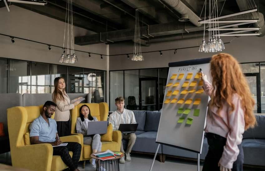 Woman presenting at a meeting