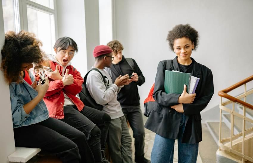 students chatting in the stairwell